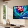 A Samsung RGB TV on a wall in a living room.