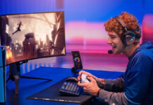 Man playing on a PlayStation 5 wearing a gaming headset.