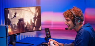Man playing on a PlayStation 5 wearing a gaming headset.