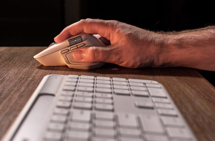 This Logitech keyboard + mouse combo wield real productivity power Logitech MX Master 4 and Signature Slim Solar+ K980 profile view from the side.
