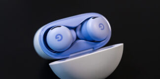 Google Pixel Buds 2a with case lid open.