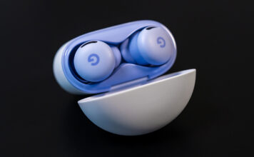 Google Pixel Buds 2a with case lid open.