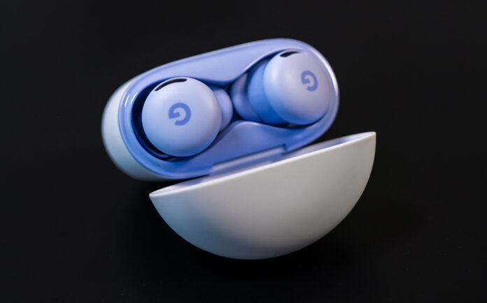 Google Pixel Buds 2a with case lid open.