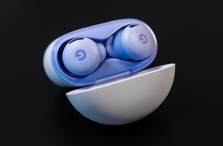 Google Pixel Buds 2a with case lid open.