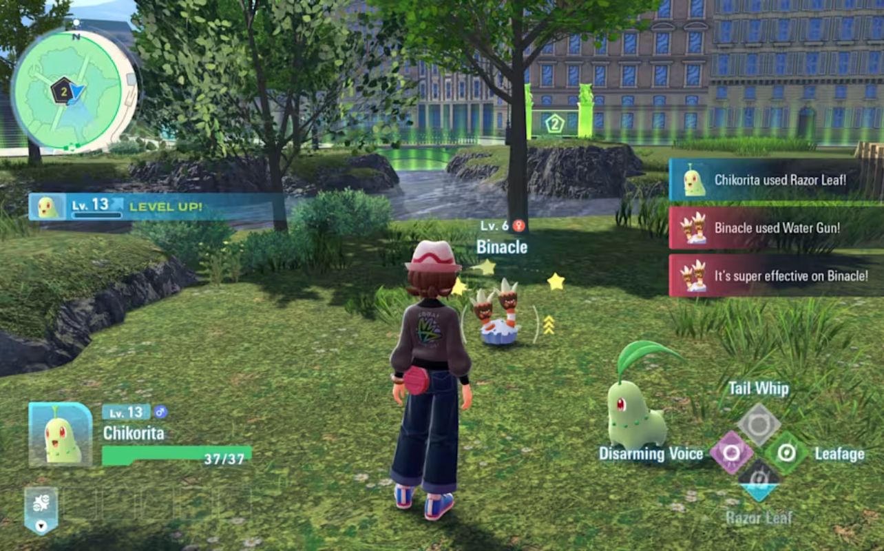 Character battles in a virtual park with Chikorita and Binacle. Chikorita uses Razor Leaf. Level up alert. Bright day, trees, and a pond.