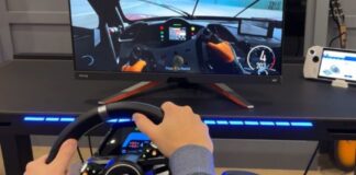 Racing Sim Banner with hands on wheel.