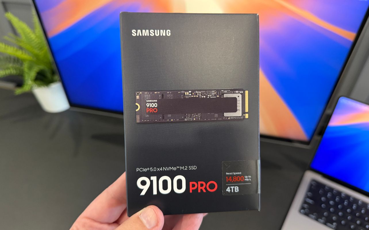 Samsung 9100 Pro SSD box held in hand, featuring read speed and capacity.