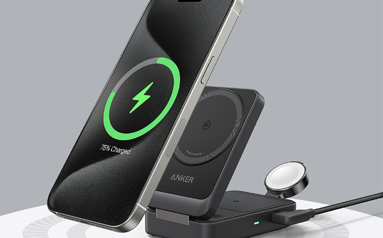 A phone going onto the Anker MagGo 3-in-1 Qi2 wireless charger.
