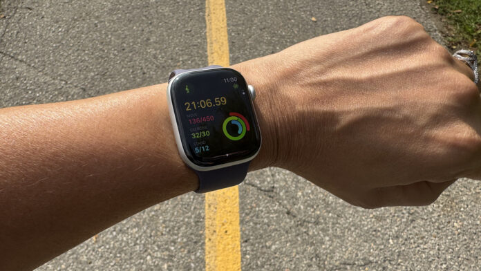 Is the Apple Watch Series 11 worth the upgrade? Apple Watch Series 11 on a wrist logging a walking workout.