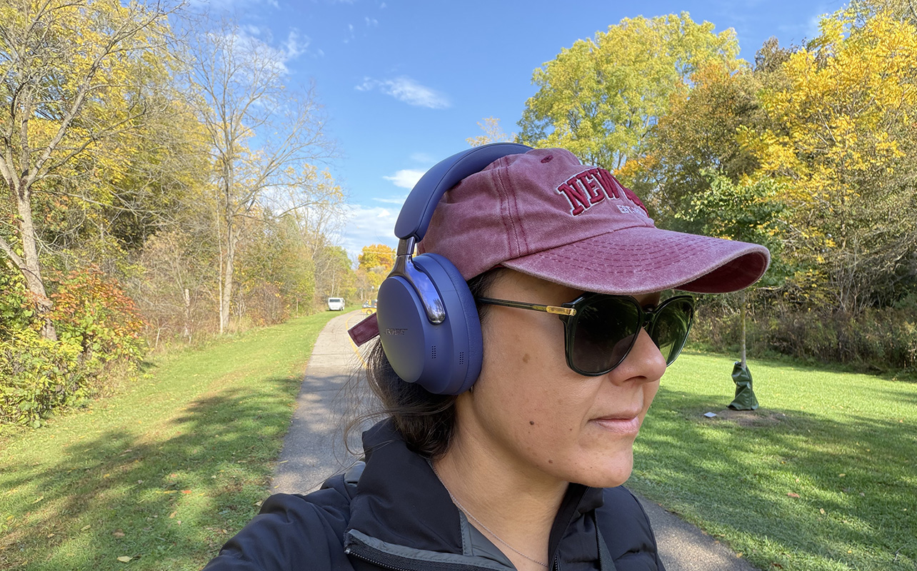 A woman wearing Bose QuietComfort Ultra 2nd Gen headphones
