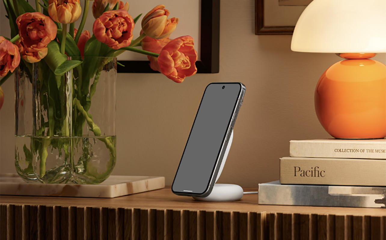 A Google Pixel phone on a Pixelsnap charger on a table.