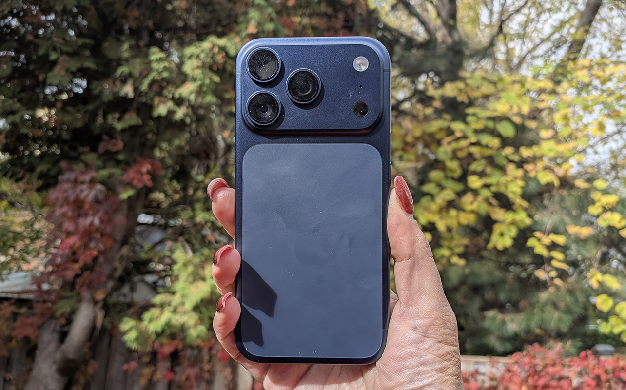 iPhone 17 Pro in front of Fall foliage.