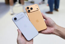 iPhone 17 series phones: which one should you get? A hand holding the iPhone Air and iPhone 17 Pro in an Apple Store.