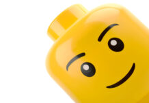 Forest Row, United Kingdom - May 5th 2015: large Lego head display figure. Shot in home studio on white.