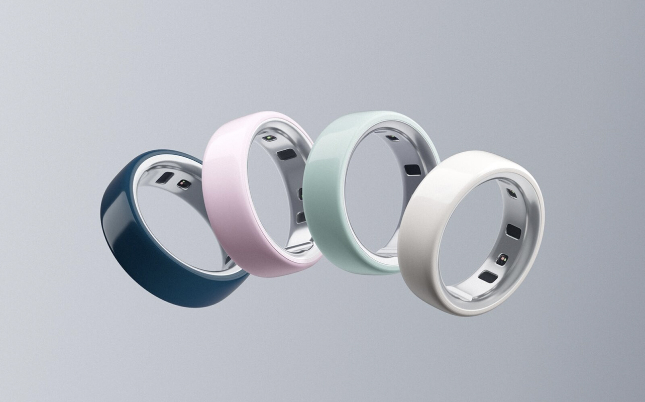 The four colours of the Oura Ring 4 Ceramic edition floating on a grey background.