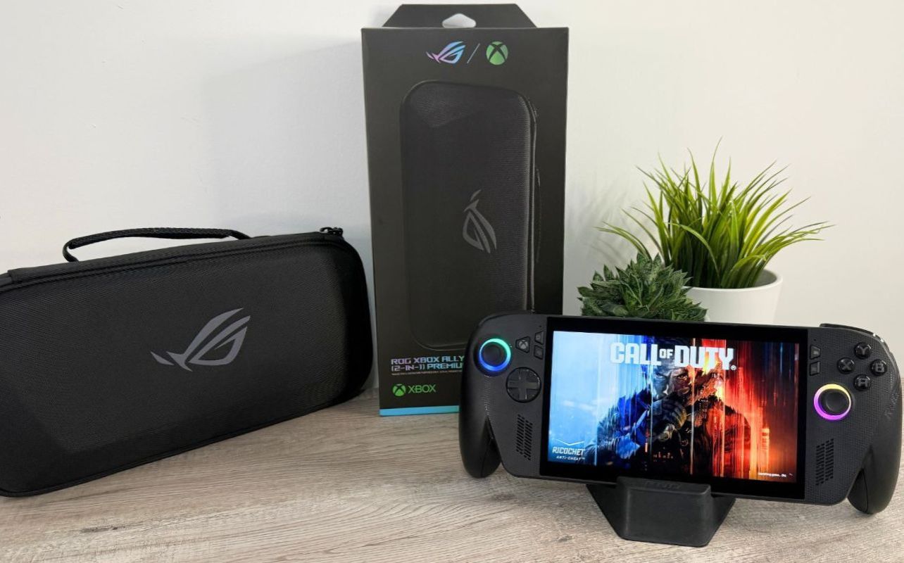 Accessories for the ROG Ally X with a travel case shown on a desk.