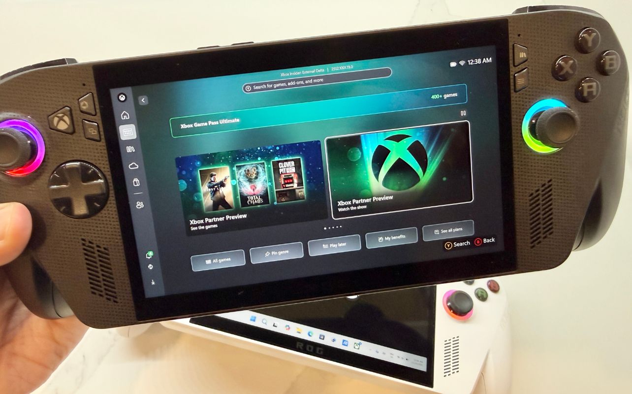 A handheld gaming PC with an Xbox Game Pass screen on its display.