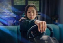 The ultimate beginner’s guide to racing and flight simulator rigs Racing Banner with person playing racing game.