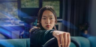 Racing Banner with person playing racing game.