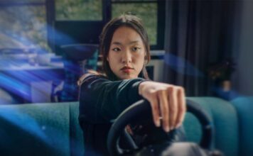 Racing Banner with person playing racing game.