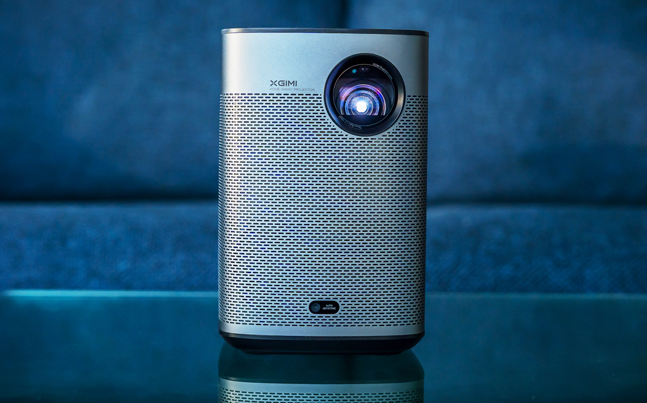 XGIMI Halo+ portable projector sitting on glass table