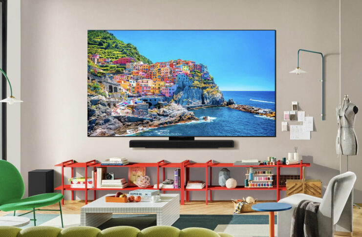 Different OLED TV technologies, explained An LG C5 OLED TV mounted on a wall in a living room.