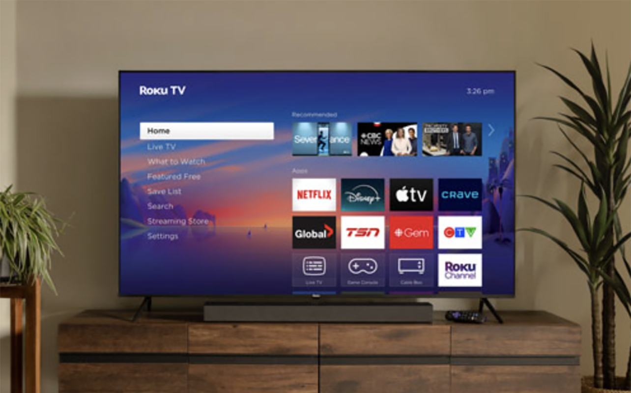 Roku Select Series TV set up on a stand.