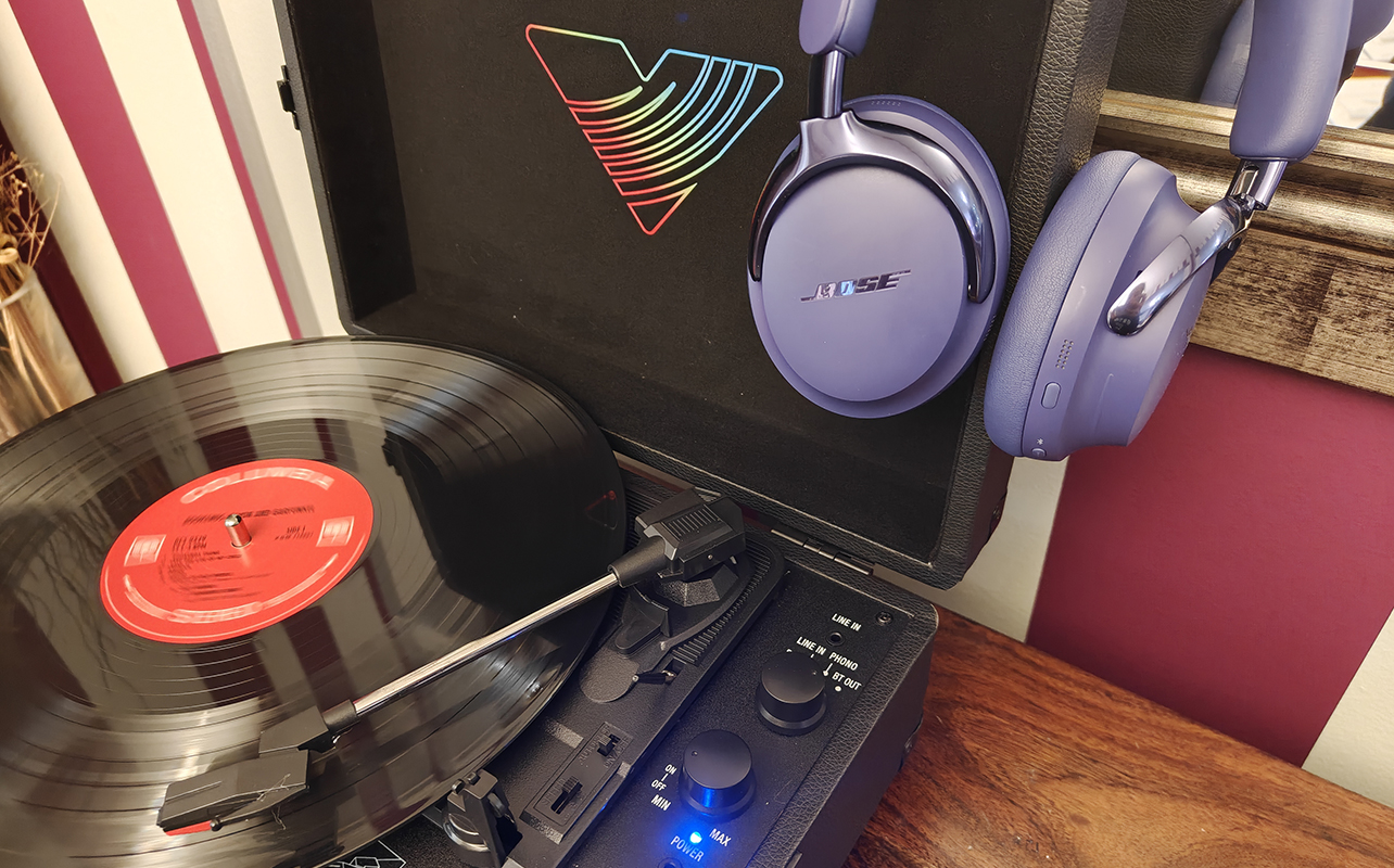 The Victrola Journey Glow record player with Bose QuietComfort Ultra 2 headphones.