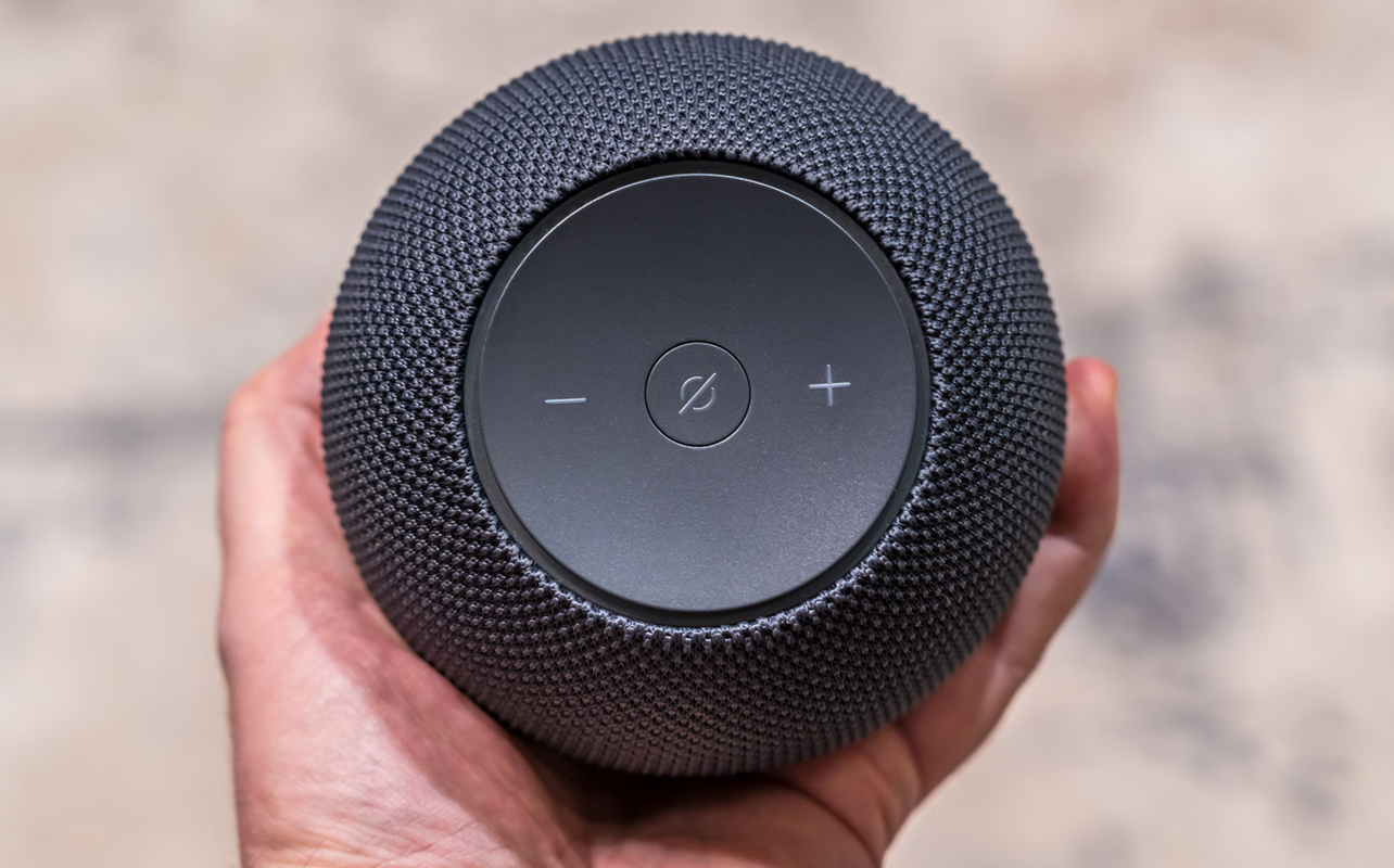 Amazon Echo Dot Max in hand.