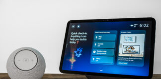 Amazon Echo Dot Max next to Echo Show 11 on table.