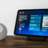 Amazon Echo Dot Max next to Echo Show 11 on table.