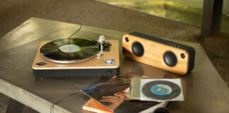 A House of Marley Stir It Up turntable with a speaker.