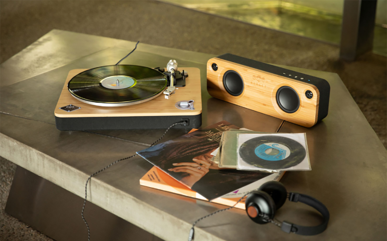 A House of Marley Stir It Up turntable with a speaker.