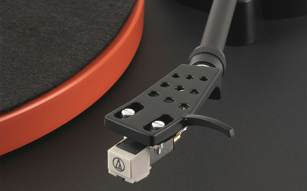 A close-up of a JBL USB turntable stylus.