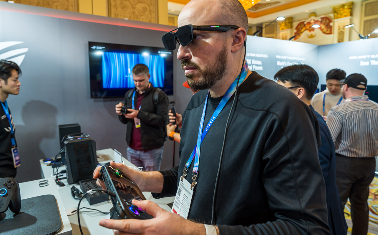 XREAL R1 glasses in gameplay while connected to Asus ROG Ally X.