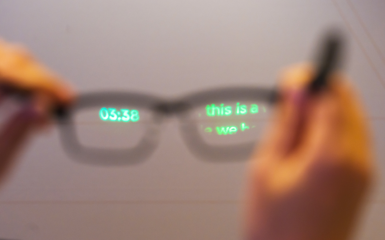 MemoMind smart glasses showing interface through lenses at CES 2026.