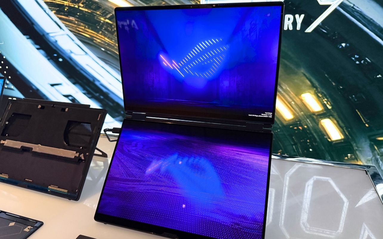 A dual screen laptop on display.