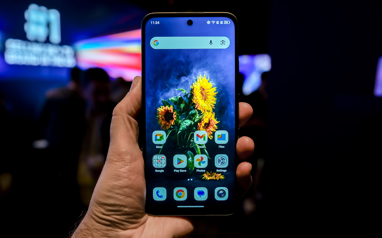 TCL NXTPAPER 70 Pro smartphone in hand.