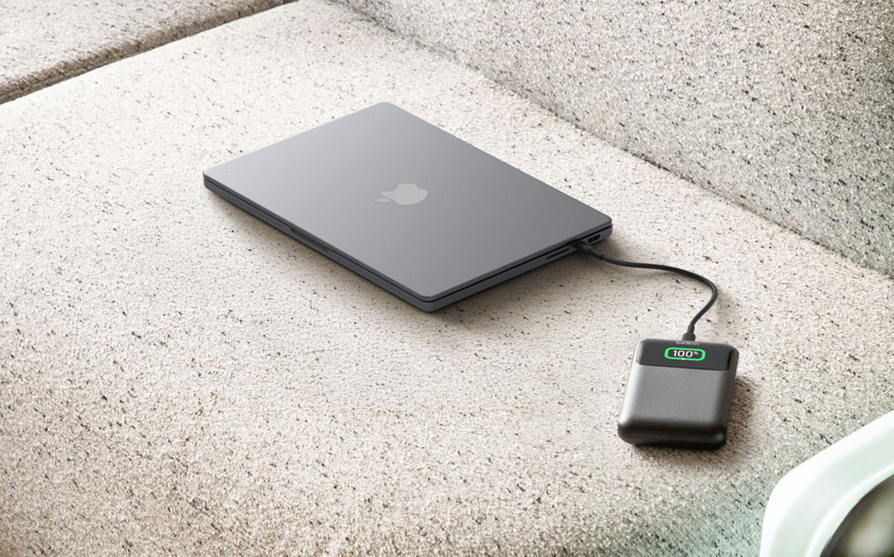 Power bank charging a laptop