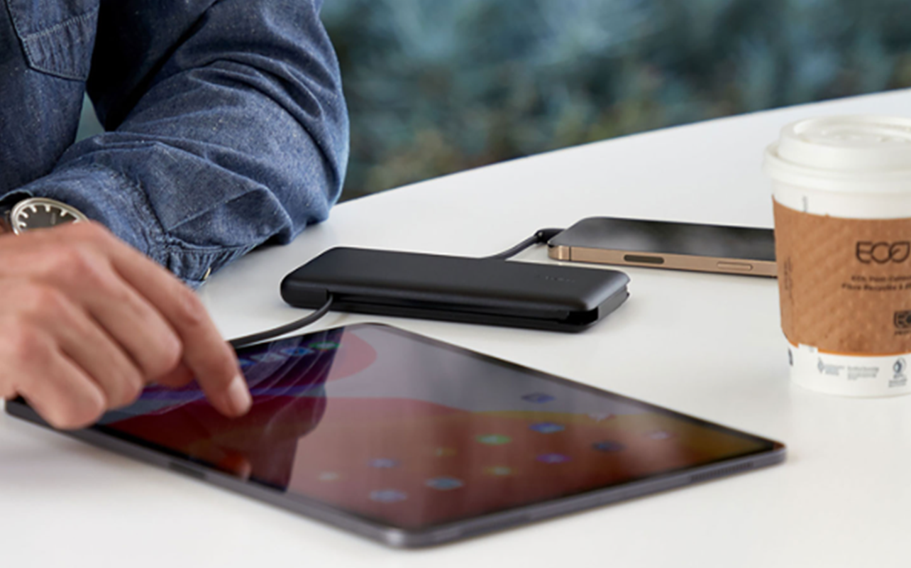 Belkin BoostCharge 10k mAh Power Bank charging a phone and tablet 