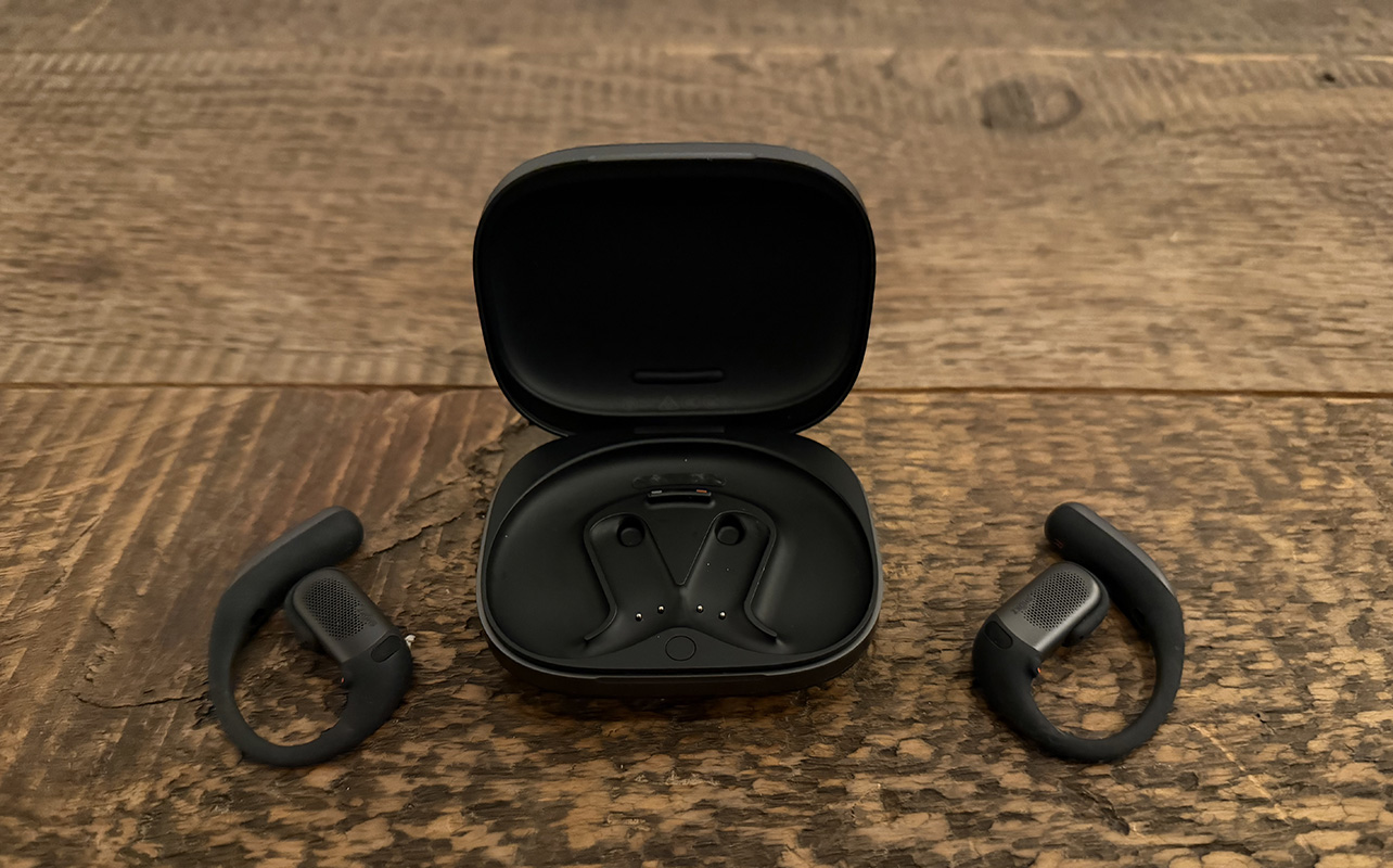 The Shokz OpenFit Pro earbuds outside of their case