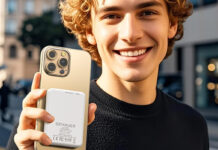 A young man holding a Szfakeur power bank.