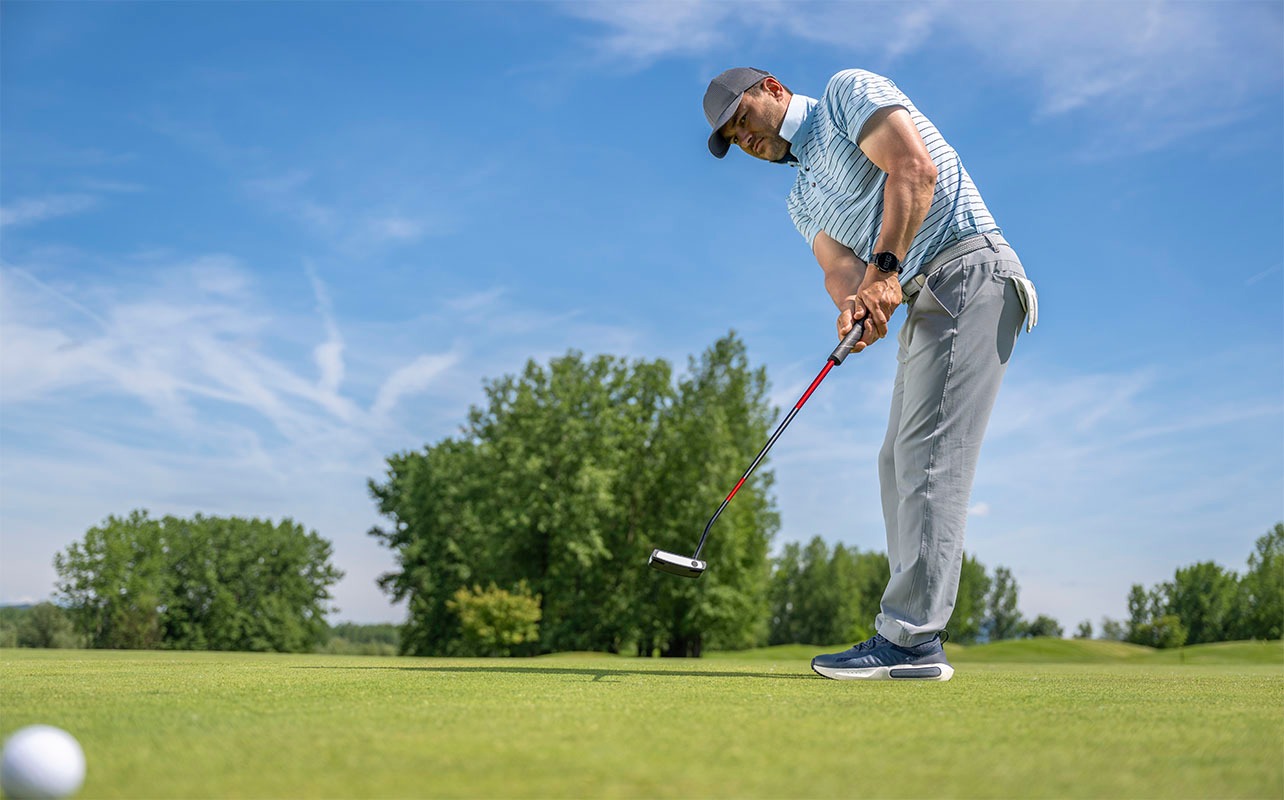 A golfer wearing a watch