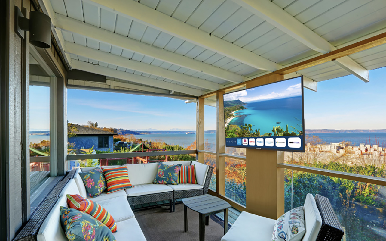 A Neptune full sun outdoor TV on a patio.