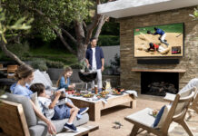 Samsung The Terrace TV with a family outside on a deck.