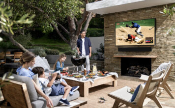 Samsung The Terrace TV with a family outside on a deck.