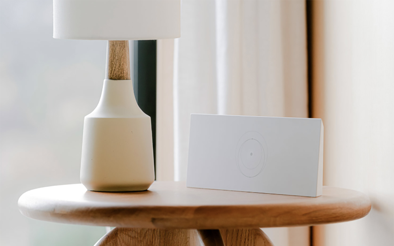 A Starlink Gen 3 mesh router on a table in a home.