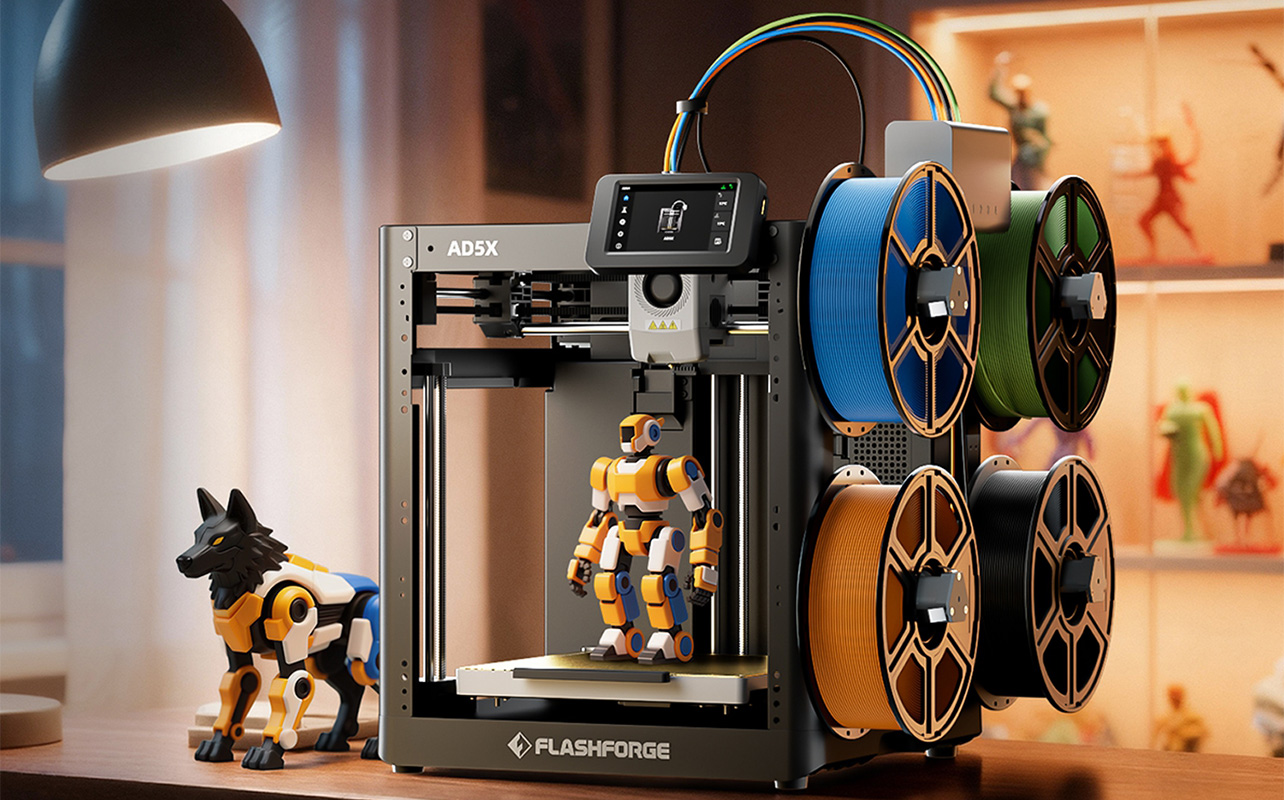 Flashforge AD5X FDM 3D printer printing a robot figurine