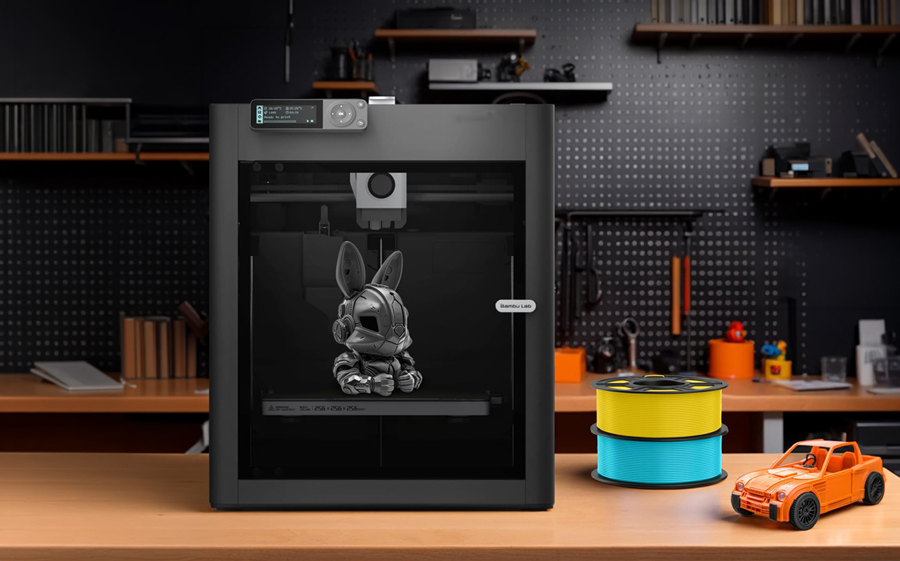 Bambu Lab 3D printer printing a figurine