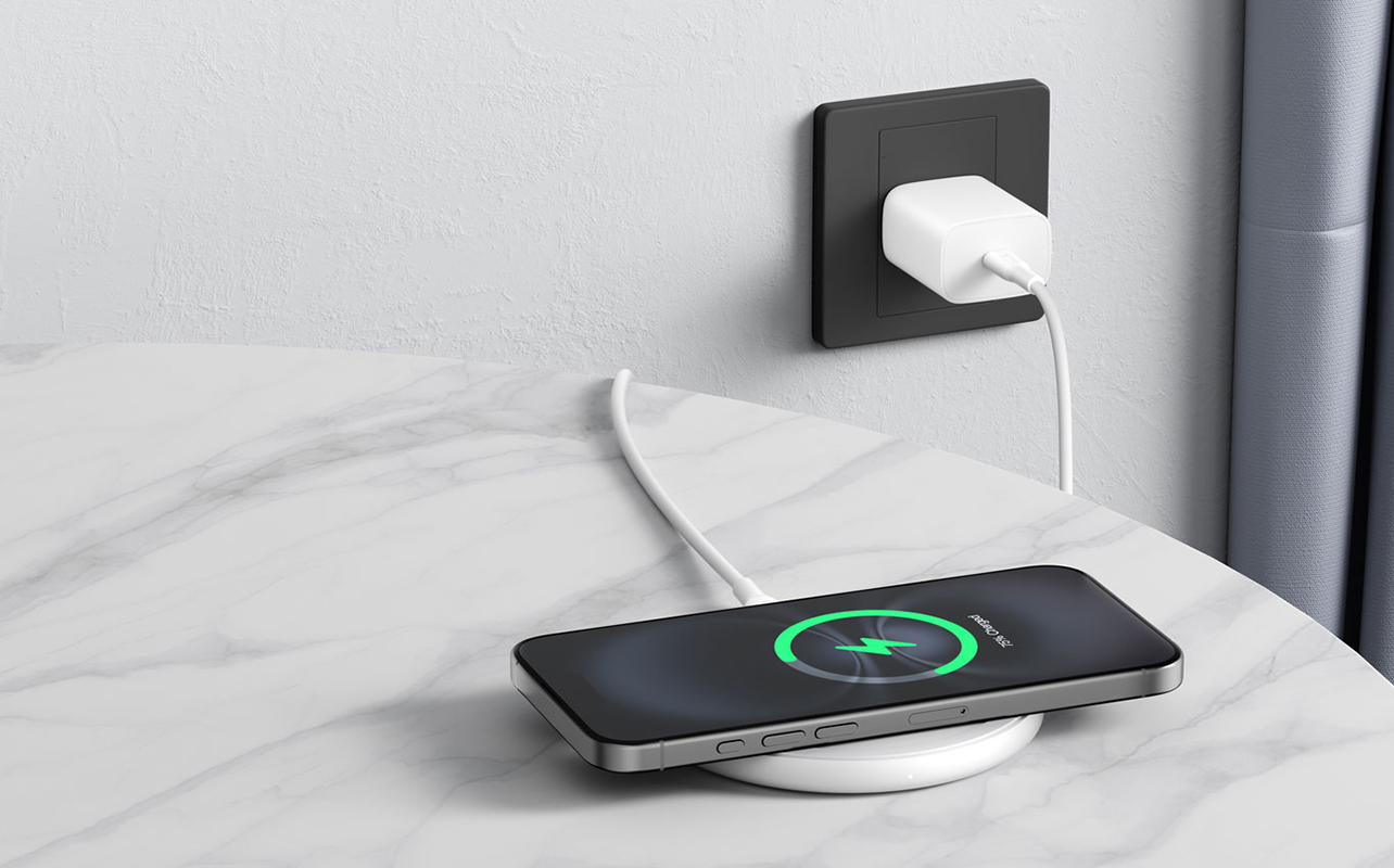 Wireless charging pad with a phone on it